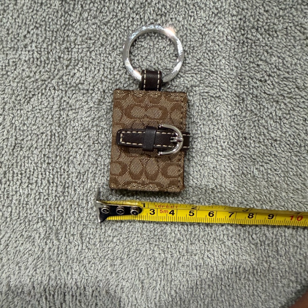 Like new- Coach Brown Patterned Picture Keychain with Silver Ring